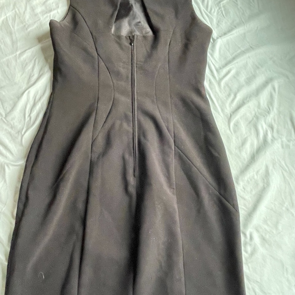 H&M little black dress size 8 with jeweled neckline.